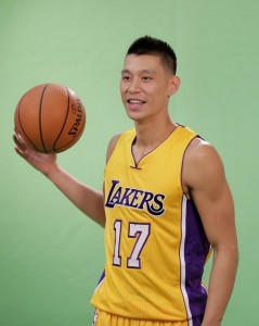 Jeremy Lin poses on Lakers' media day as he awaits the opportunity to play in the legendary purple and gold uniform.